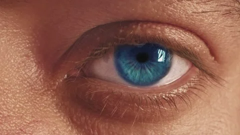 Close up macro blue eye opening human iris natural beauty. Stock Footage 160104678