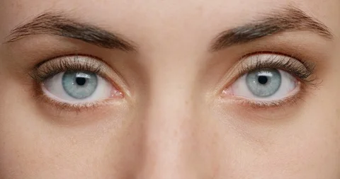 Close up macro blue eyes opening natural human beauty Stock Footage 96943732
