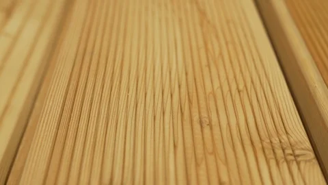 Close up macro camera movement on a freshly processed wooden Board at a woodwork Video stock 123418104
