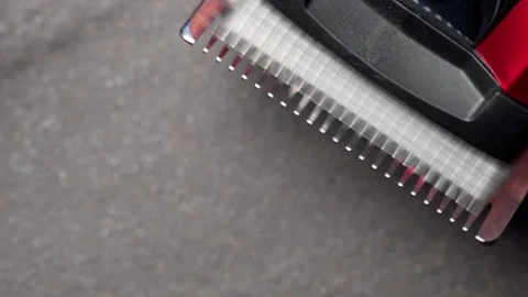 A close up macro clip of professional quality barbers clippers blades in 100f Vídeos de archivo 149063100