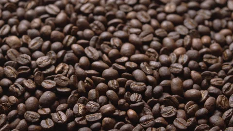 Close up macro coffee beans detailed roasted grains texture bokeh Stock Footage 239097902