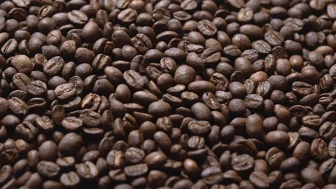 Close up macro coffee beans detailed roasted grains texture bokeh Stock Footage 239098871