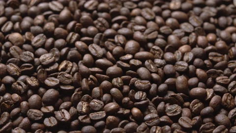 Close up macro coffee beans detailed roasted grains texture bokeh Stock Footage 239099218