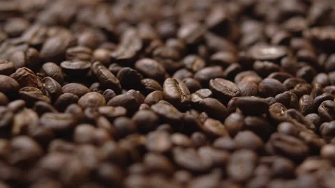 Close up macro coffee beans detailed roasted grains texture bokeh Stock Footage 239103941