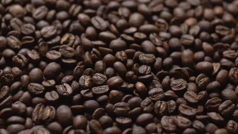 Close up macro coffee beans detailed roasted grains texture bokeh Stock Footage 239115057