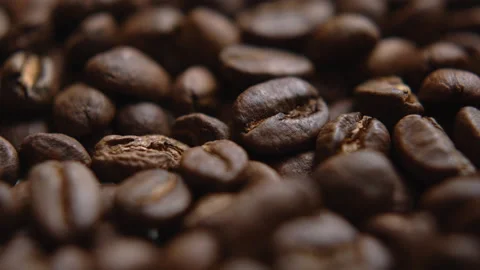 Close up macro coffee beans detailed roasted grains texture bokeh Stock Footage 239115576