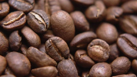 Close up macro coffee beans detailed roasted grains texture bokeh Stock Footage 239116420