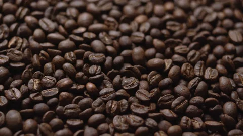 Close up macro coffee beans detailed roasted grains texture bokeh Stock Footage 239116421