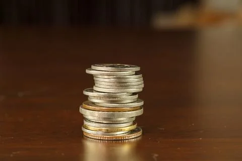 Close up macro of the coins single stack. Stock Photos