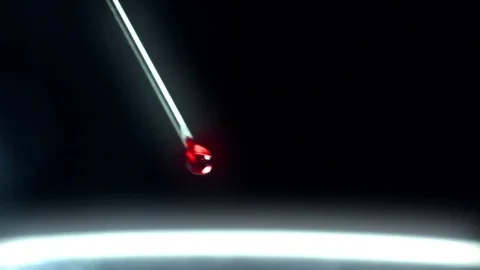 Close-up macro Drop of blood falling from syringe on black  background Stock Footage 74283940