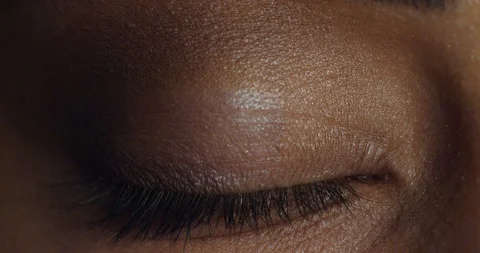 Close up macro eye hallucinating intense drug addiction with light flashing Stock Footage 97006664