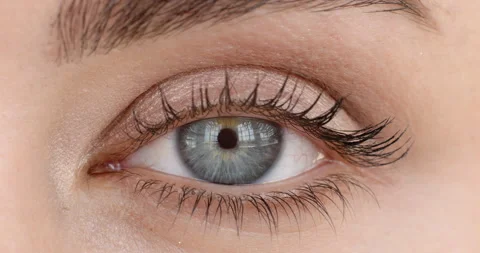 Close up macro eye opening human iris beautiful blue eye healthy eyesight Stock Footage 138393335
