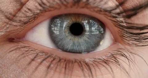 Close up macro eye opening human iris beautiful blue eye healthy eyesight Vidéo 138393428