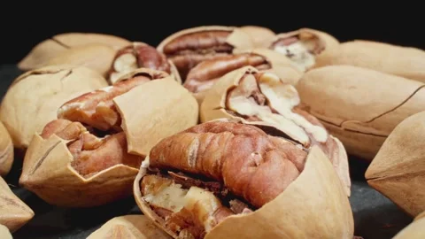 Close-up macro footage of pecans. Dolly shot using slider and macro probe lens Video stock 292486460