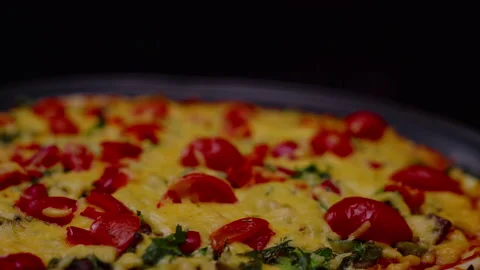 Close-up, macro, forward movement with a turn, pizza with cheese and tomatoes on Stock Footage 183053221
