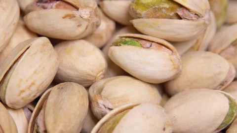 Close up. macro. Fried pistachios in a shell rotate in a circle. background Video stock 113846820