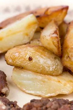 Close up macro fried young potatoes Stock Photos