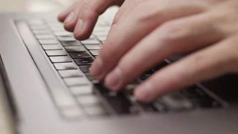 Close up macro of hands typing on laptop keyboard computer Stock Footage 274293606