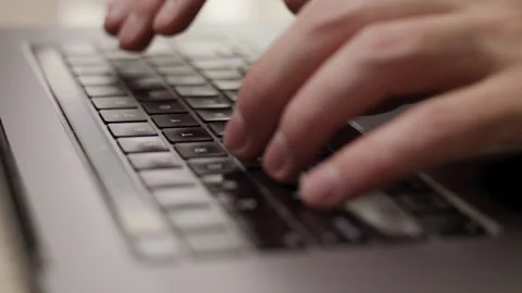 Close up macro of hands typing on laptop keyboard computer Stock Footage 274293677