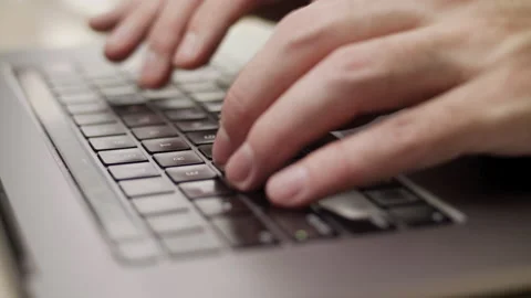 Close up macro of hands typing on laptop keyboard computer Stock Footage 274295989
