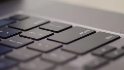Close up macro of hands typing on laptop keyboard computer Stock Footage 274297959