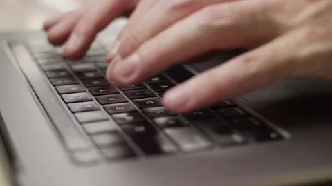 Close up macro of hands typing on laptop keyboard computer Stock Footage 274297983