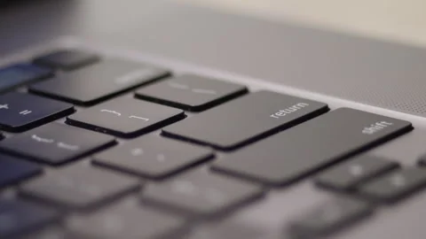 Close up macro of hands typing on laptop keyboard computer Video stock 274297997