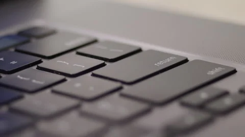 Close up macro of hands typing on laptop keyboard computer Stock Footage 274298007