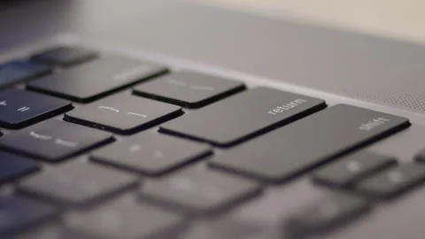 Close up macro of hands typing on laptop keyboard computer Stock Footage 274298237