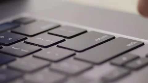 Close up macro of hands typing on laptop keyboard computer Stock Footage 274298339