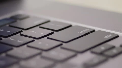 Close up macro of hands typing on laptop keyboard computer Stock Footage 274298342