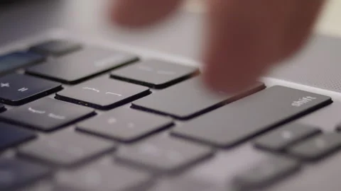 Close up macro of hands typing on laptop keyboard computer Stock Footage 274298498