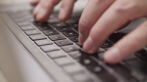 Close up macro of hands typing on laptop keyboard computer Stock Footage 274299088