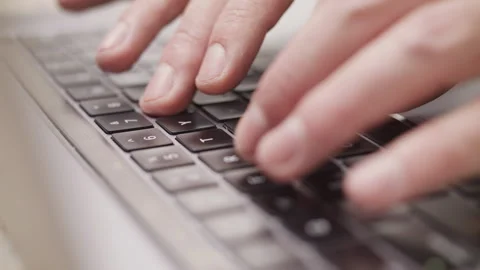 Close up macro of hands typing on laptop keyboard computer Stock Footage 274299508