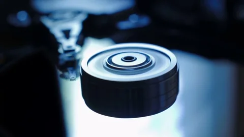 Close up macro Hard Disk Drive, blue reflections. Working HDD at night. Stock Footage 80113188