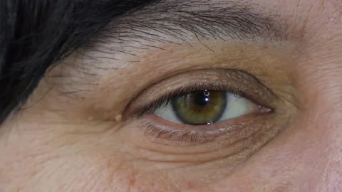 Close-up macro human eye opening iris eyes beautiful black eyes healthy vision Stock Footage 233725858