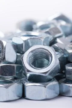 Close up macro image of metal nuts Stock Photos