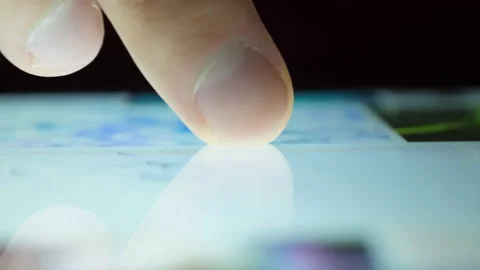 Close up Macro Man Browsing Tablet Computer With Finger. Person Using Smartph Stock-Footage 142997876