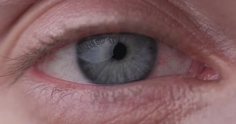 Close up Macro of Man Opening a Beautiful Blue Azure Eye looking at the Camera Видео 150556260