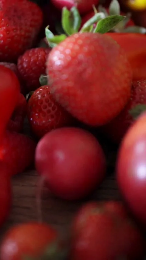 Close up macro pan over fresh red fruits including Stock Footage 333159018