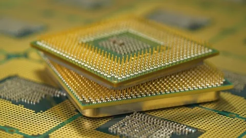 Close macro of PC processor pins revealing the intricate engineering of CPUs Stock Footage 334002424