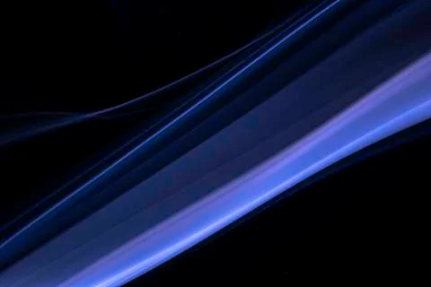 A close up macro photo of a diagonal wisp of blue smoke on a black background Stock Photos