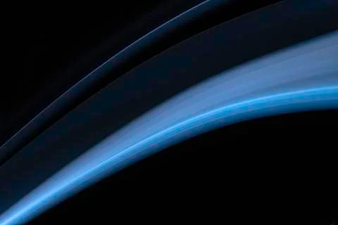 A close up macro photo of a diagonal wisp of blue smoke on a black background Stock Photos