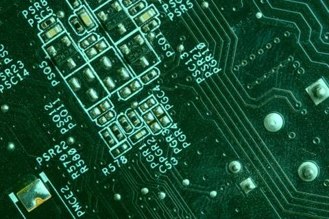 A close up macro photo of a generic technology motherboard circuit board (pcb Stock Photos