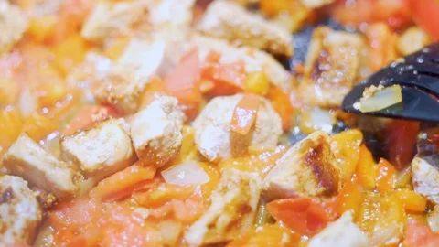 Close-up macro process of stirring food fried stew steaming meat with colorful v Video stock 119264119