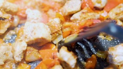 Close-up macro process of stirring food fried stew steaming meat with colorful v Video stock 119264167