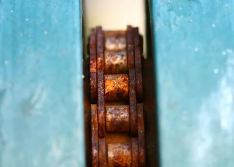 Close up macro rusty chain and gear Stock Photos