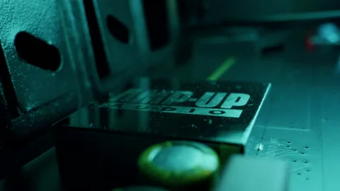 Close-up macro shot of the audio system with AMP-UP Audio logo on motherboard Stock Footage 202652785