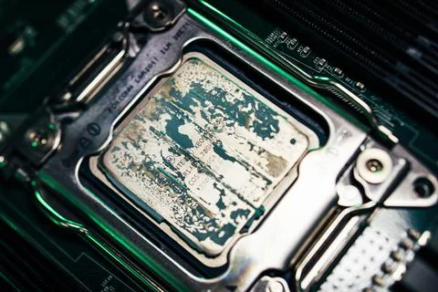 Close-up macro shot of computer CPU central processor unit covered with thermal 스톡 사진