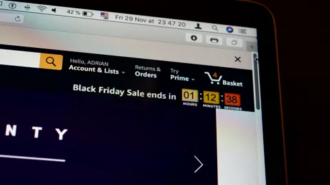 Close-up macro shot of computer screen with Amazon.com website advertising the Stock Footage 165738459